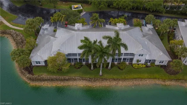 an aerial view of a house having yard