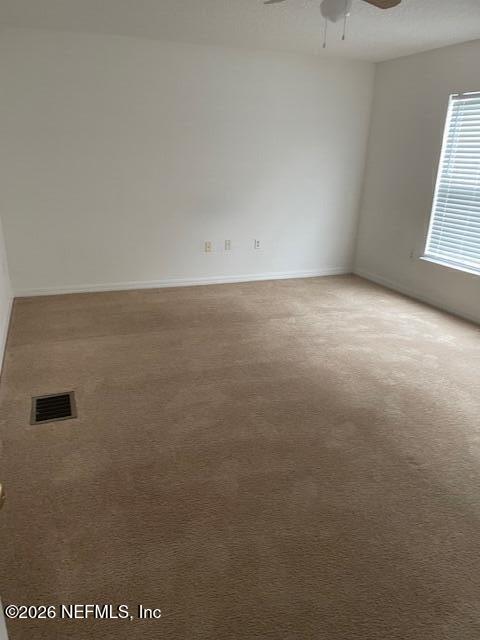 87045 Kipling Drive Yulee, FL 32097 - Photo 12 of 18 an empty room with a window