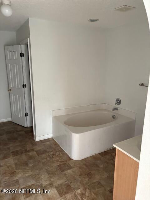 87045 Kipling Drive Yulee, FL 32097 - Photo 13 of 18 a view of a bathtub in a bathroom
