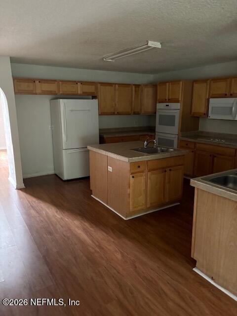 87045 Kipling Drive Yulee, FL 32097 - Photo 5 of 18 a kitchen with stainless steel appliances wooden floors and a stove