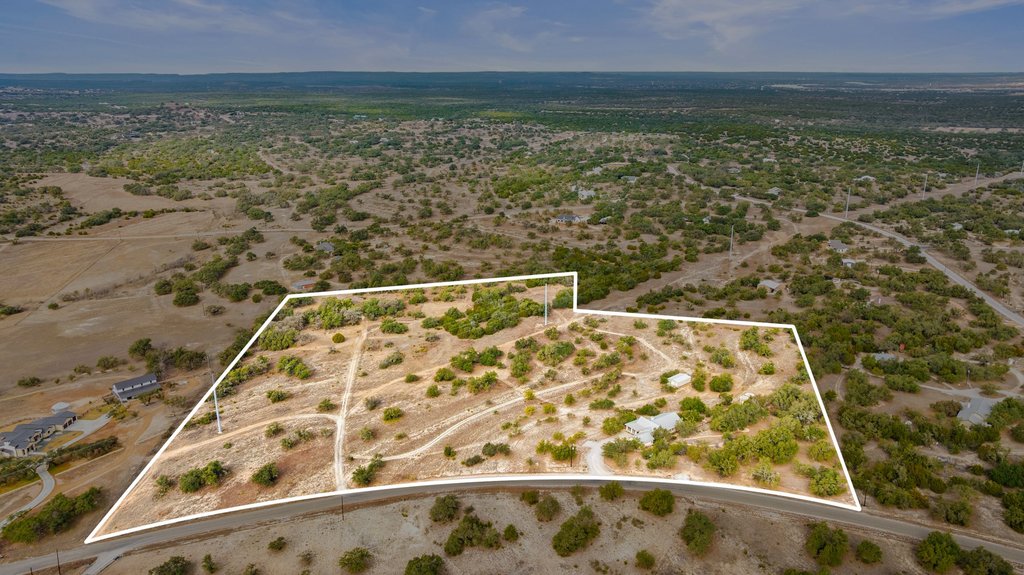 232 Crooked Oak Round Mountain, TX 78663 - Photo 40 of 40 Aerial view of sparsely populated area with property boundaries highlighted