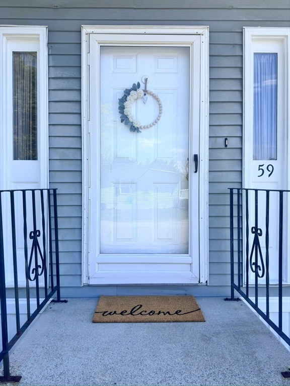 59 Castle Road Attleboro, MA 02703 - Photo 2 of 30 a view of an entryway door