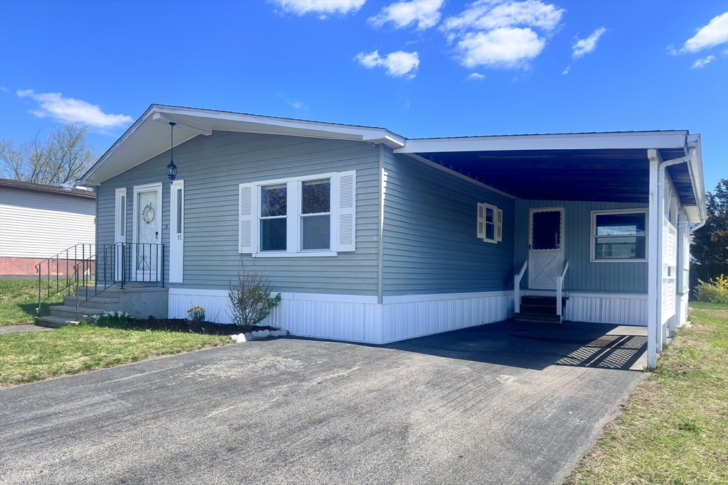 59 Castle Road Attleboro, MA 02703 - Photo 23 of 30 a front view of a house with a yard
