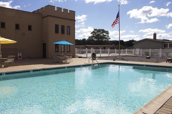 59 Castle Road Attleboro, MA 02703 - Photo 26 of 30 a view of a swimming pool with a lake