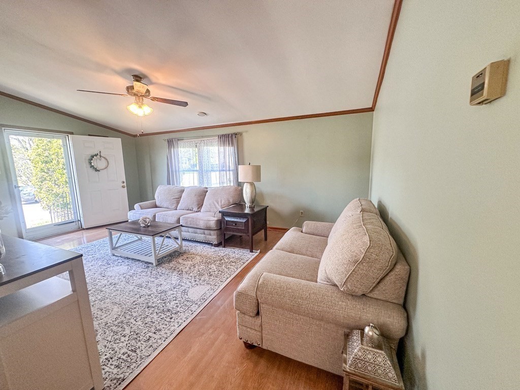 59 Castle Road Attleboro, MA 02703 - Photo 6 of 30 a living room with furniture and a wooden floor