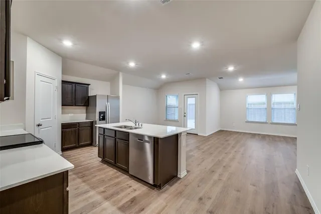 a kitchen with a stove and a microwave