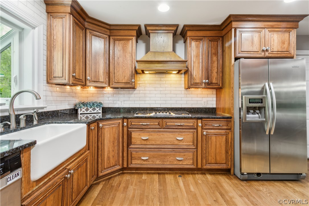 204 Old Cart Road Williamsburg, VA 23188 - Photo 15 of 49 a kitchen with stainless steel appliances granite countertop a sink a stove and a refrigerator