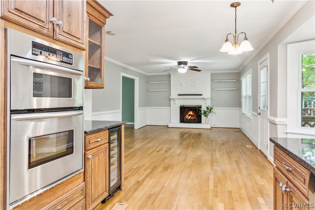 204 Old Cart Road Williamsburg, VA 23188 - Photo 17 of 49 a view of a kitchen stove a microwave and furniture