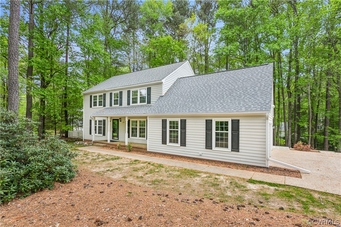 204 Old Cart Road Williamsburg, VA 23188 - Photo 2 of 49 front view of a house with a yard
