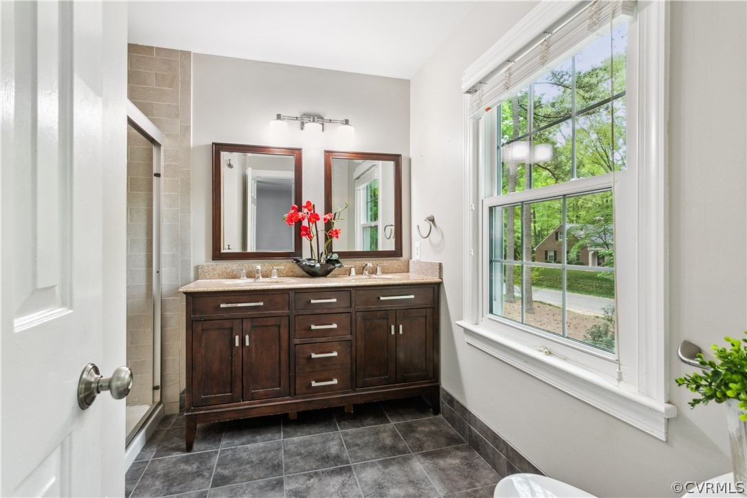 204 Old Cart Road Williamsburg, VA 23188 - Photo 22 of 49 a living room with a large window couches and living room view