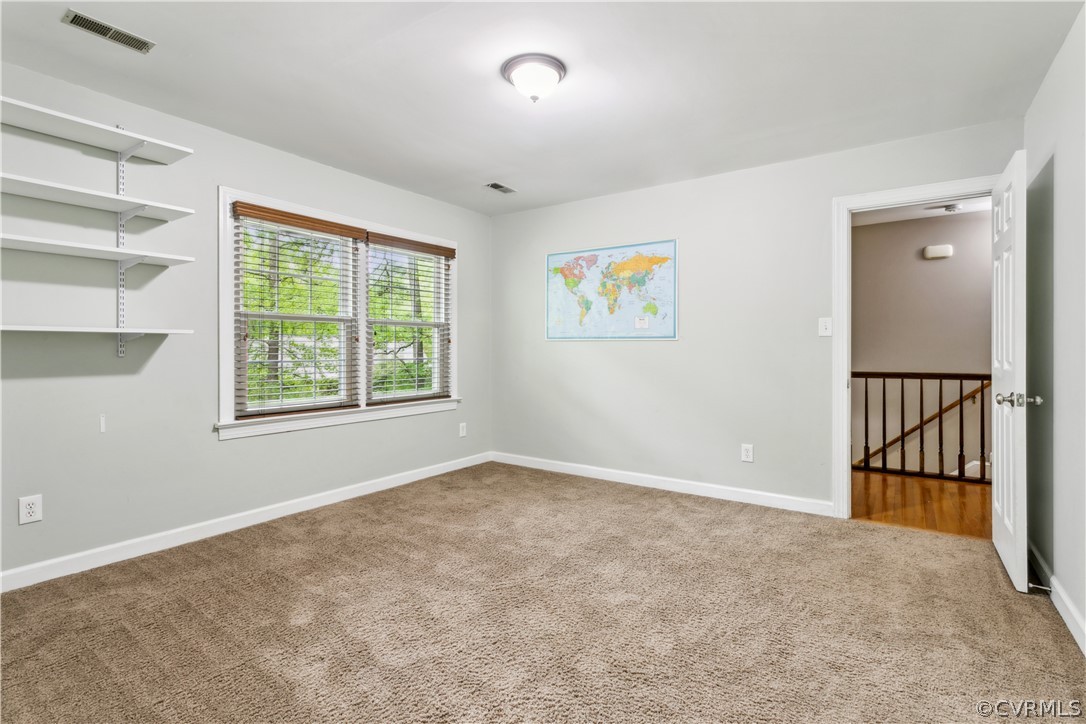 204 Old Cart Road Williamsburg, VA 23188 - Photo 30 of 49 an empty room with windows and closet