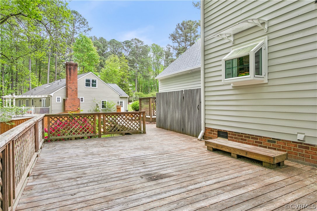 204 Old Cart Road Williamsburg, VA 23188 - Photo 34 of 49 a view of a house with a roof deck