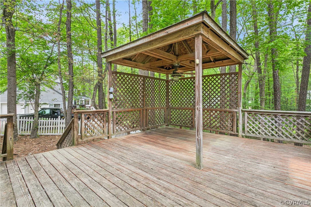 204 Old Cart Road Williamsburg, VA 23188 - Photo 37 of 49 a view of a wooden deck next to a yard