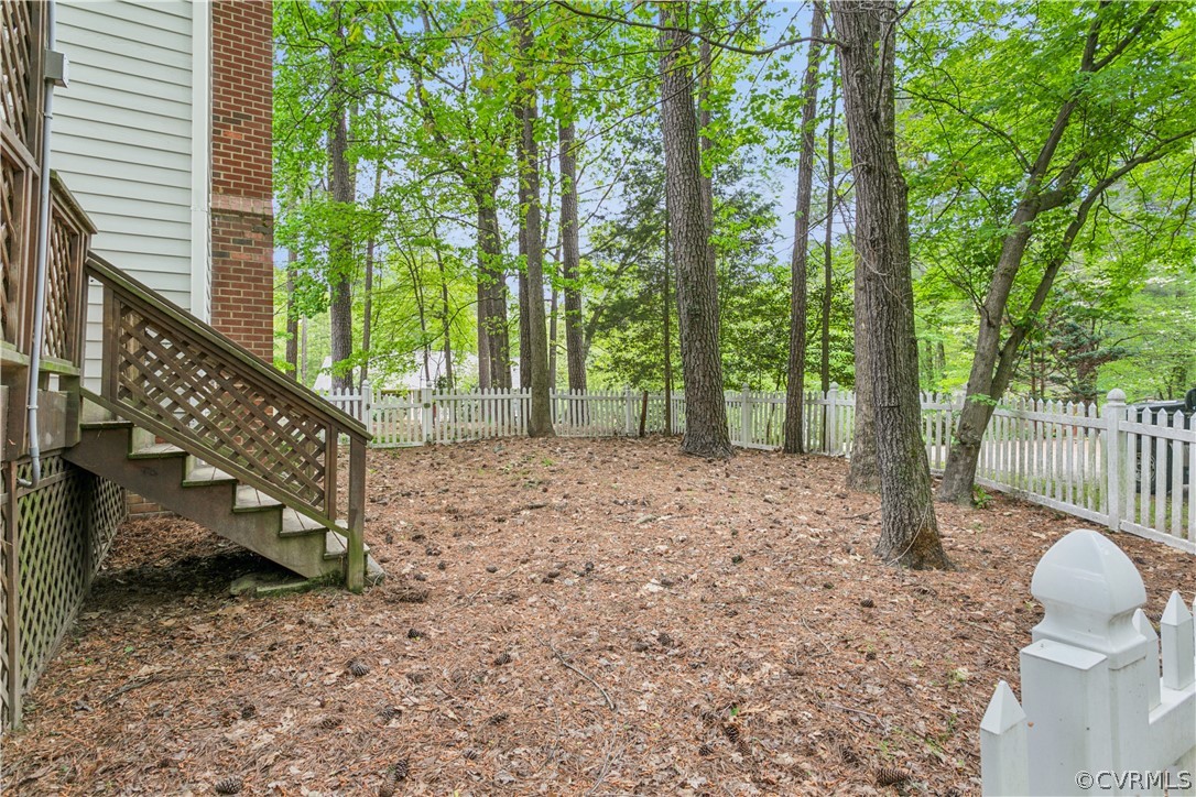 204 Old Cart Road Williamsburg, VA 23188 - Photo 38 of 49 a view of a house with a backyard and stairs