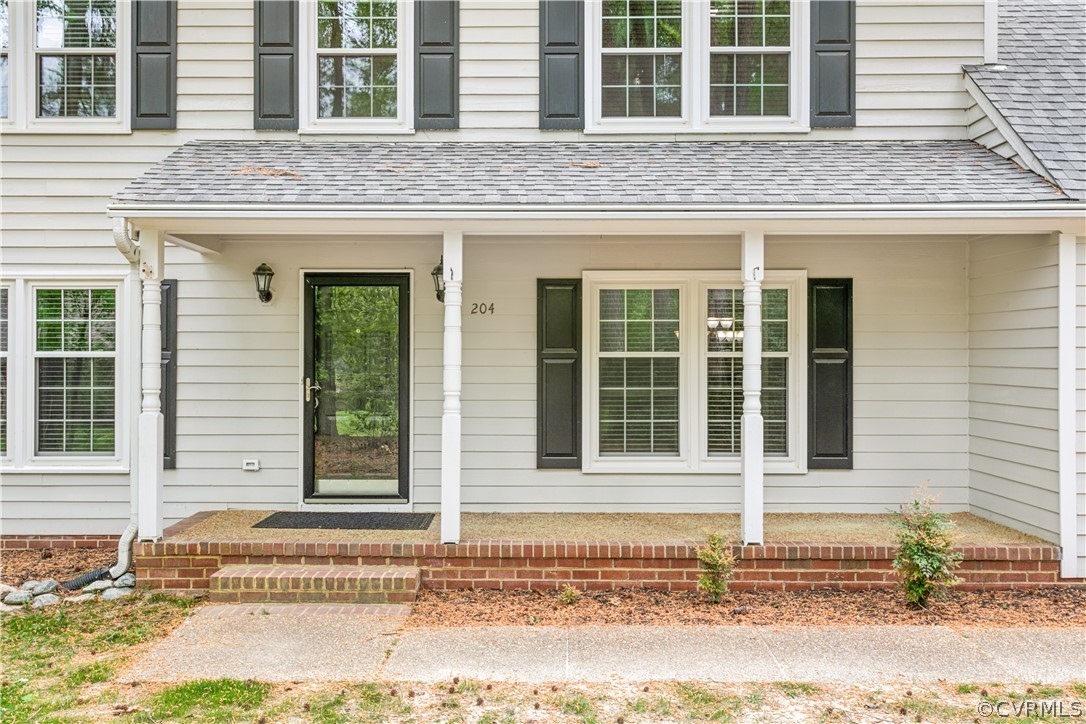 204 Old Cart Road Williamsburg, VA 23188 - Photo 4 of 49 a house with trees in front of it