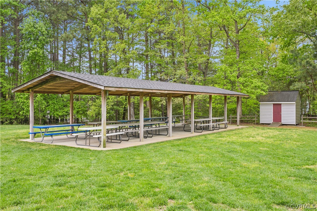 204 Old Cart Road Williamsburg, VA 23188 - Photo 42 of 49 a view of a house with a yard and a large tree