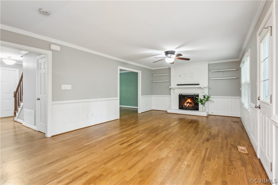204 Old Cart Road Williamsburg, VA 23188 - Photo 9 of 49 a view of a livingroom with a fireplace and a chandelier