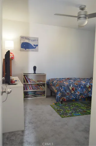 a living room with a couch and a table