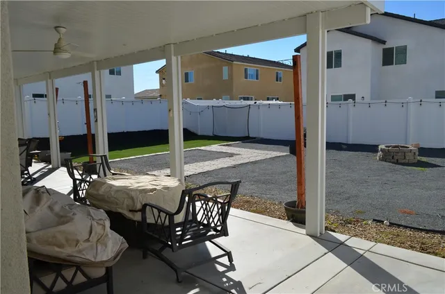 a view of living room and patio