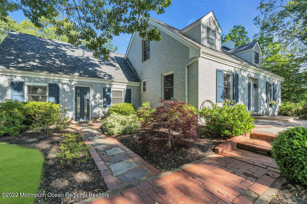 30 Brand Road Toms River, NJ 08753 - Photo 4 of 54 a front view of a house with garden