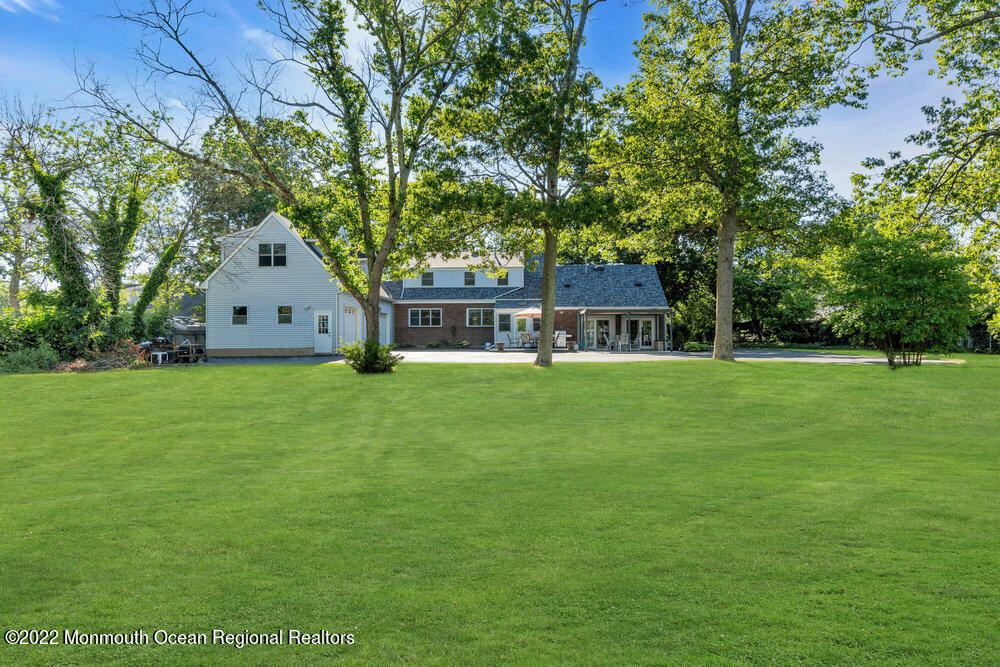 30 Brand Road Toms River, NJ 08753 - Photo 49 of 54 a front view of a house with garden