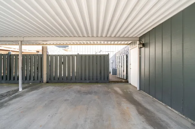 a view of a room with wooden walls