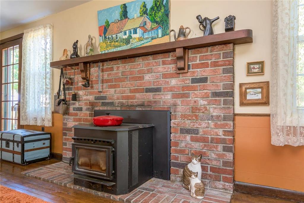 46 Rust Road Gorham, ME 04038 - Photo 8 of 34 Pellet stove in dining room.