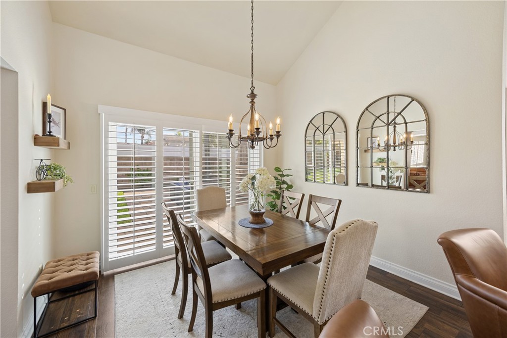 7051 Stanislaus Place Rancho Cucamonga, CA 91701 - Photo 11 of 57 a view of a dining room with furniture and window