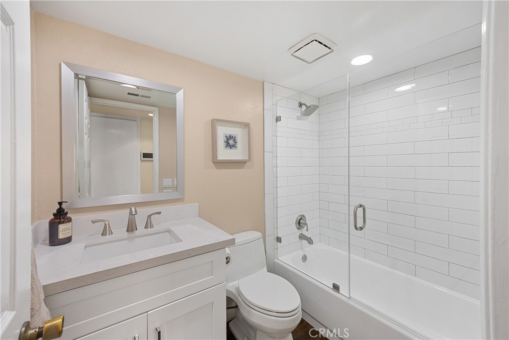 7051 Stanislaus Place Rancho Cucamonga, CA 91701 - Photo 16 of 57 a bathroom with a sink a toilet and shower