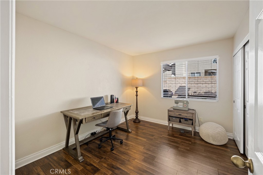 7051 Stanislaus Place Rancho Cucamonga, CA 91701 - Photo 17 of 57 a view of a workspace with furniture and a window