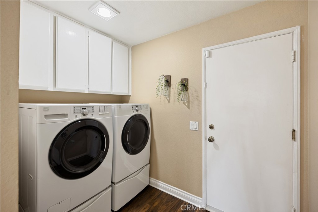 7051 Stanislaus Place Rancho Cucamonga, CA 91701 - Photo 18 of 57 a utility room with dryer and washer