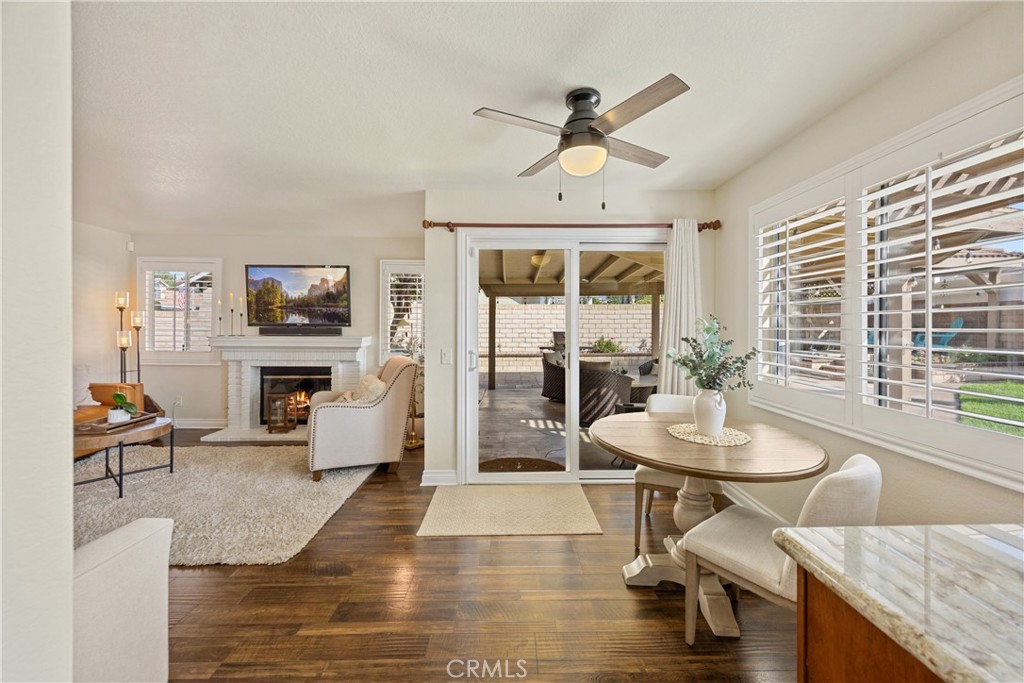 7051 Stanislaus Place Rancho Cucamonga, CA 91701 - Photo 20 of 57 a living room with fireplace furniture and a flat screen tv