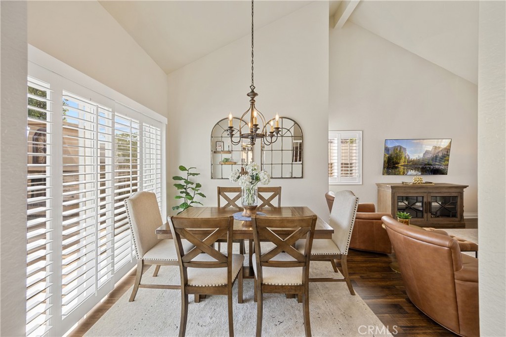 7051 Stanislaus Place Rancho Cucamonga, CA 91701 - Photo 24 of 57 a view of a dining room with furniture window and outside view