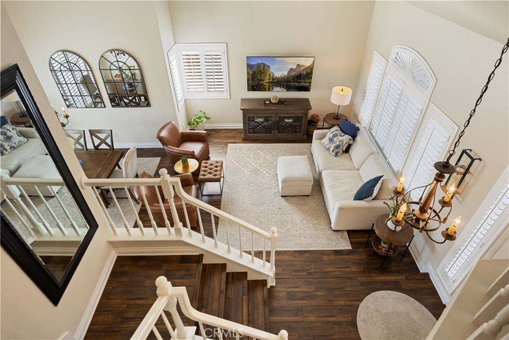7051 Stanislaus Place Rancho Cucamonga, CA 91701 - Photo 26 of 57 a living room with furniture and a flat screen tv