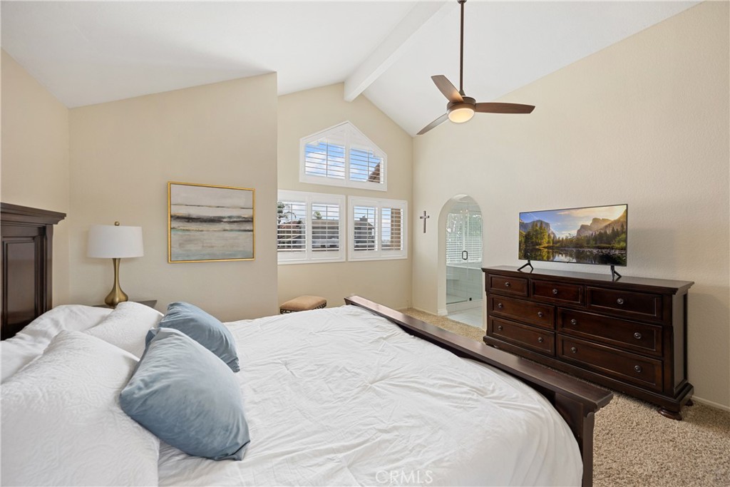 7051 Stanislaus Place Rancho Cucamonga, CA 91701 - Photo 32 of 57 a bedroom with a bed and a window