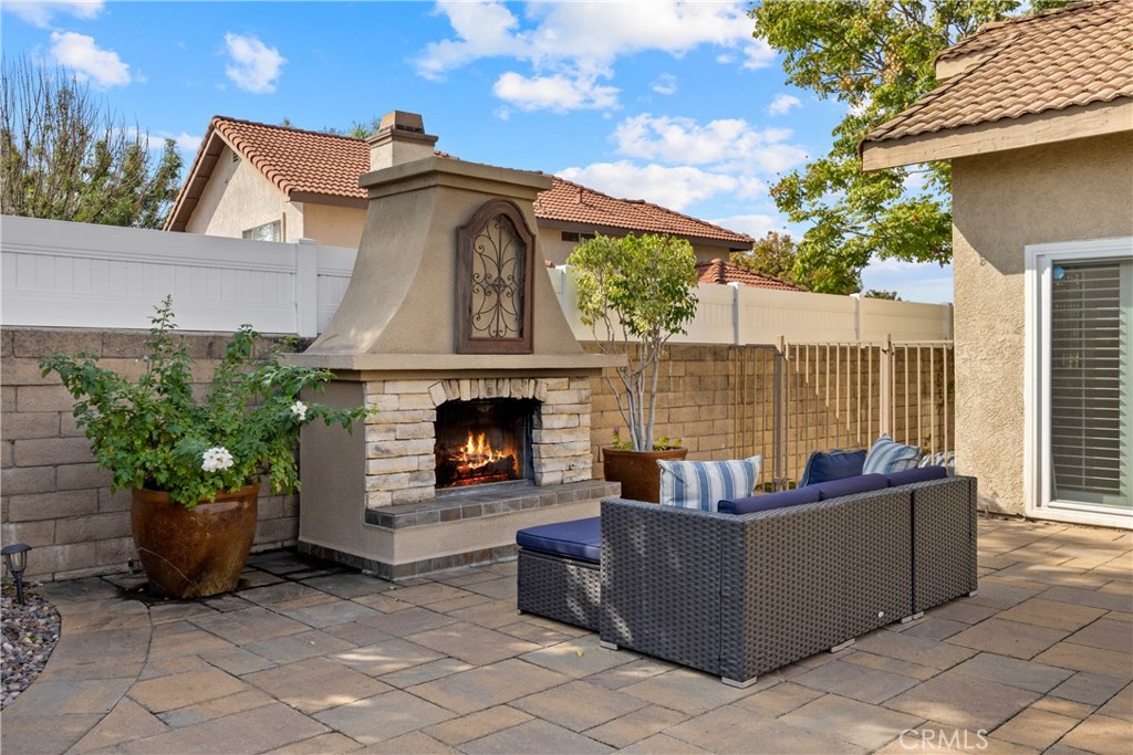 7051 Stanislaus Place Rancho Cucamonga, CA 91701 - Photo 41 of 57 a view of a couches in the patio with a fire pit