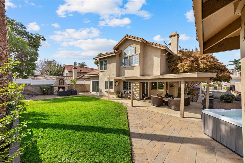 7051 Stanislaus Place Rancho Cucamonga, CA 91701 - Photo 43 of 57 a view of a house with a yard patio and sitting area