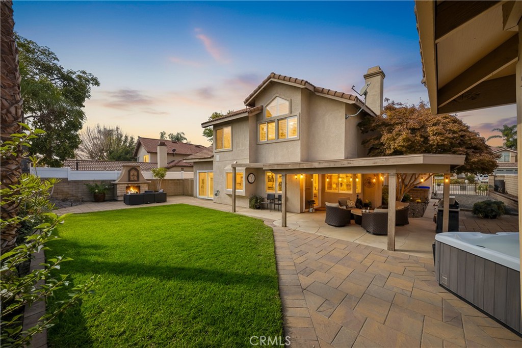 7051 Stanislaus Place Rancho Cucamonga, CA 91701 - Photo 44 of 57 a view of a house with backyard and porch