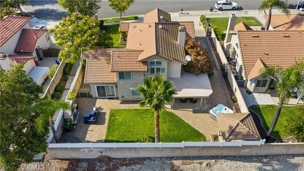 7051 Stanislaus Place Rancho Cucamonga, CA 91701 - Photo 51 of 57 an aerial view of a house with swimming pool