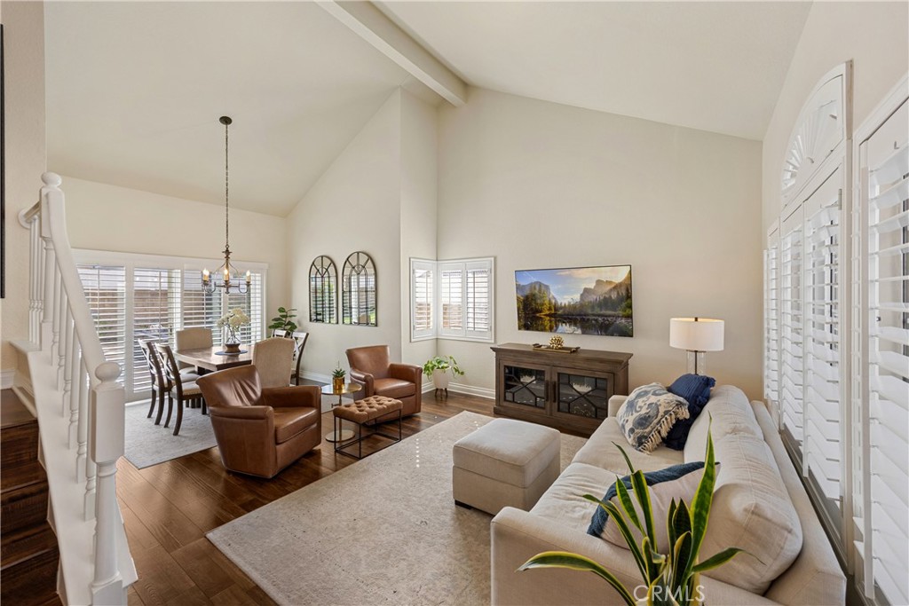 7051 Stanislaus Place Rancho Cucamonga, CA 91701 - Photo 8 of 57 a living room with furniture fireplace and a flat screen tv
