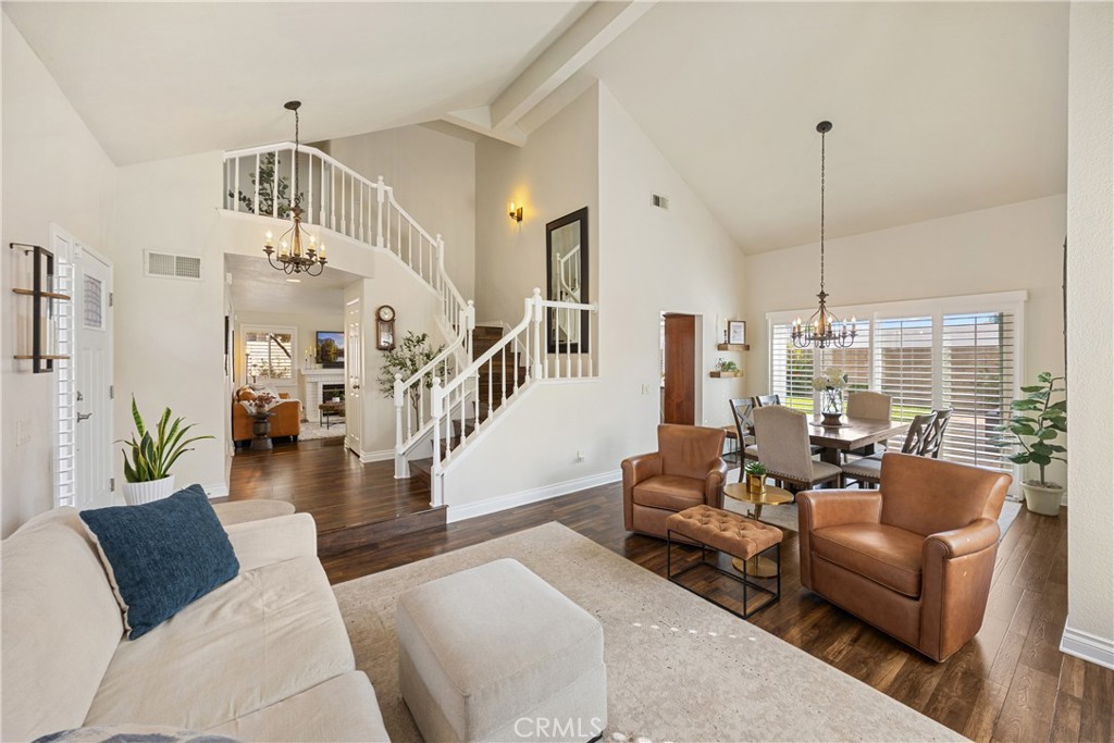 7051 Stanislaus Place Rancho Cucamonga, CA 91701 - Photo 9 of 57 a living room with furniture and wooden floor
