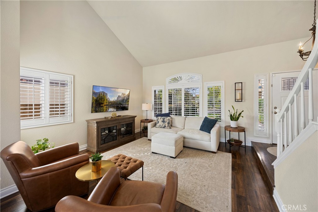 7051 Stanislaus Place Rancho Cucamonga, CA 91701 - Photo 10 of 57 a living room with furniture and a flat screen tv