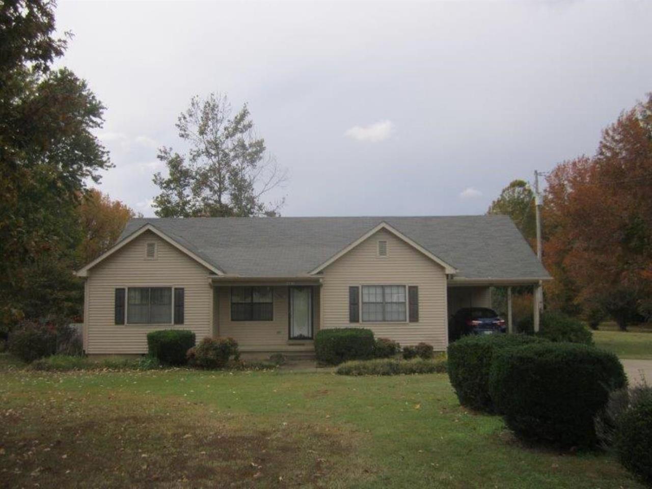 1741 Conner Whitefield Road Ripley, TN 38063 - Photo 1 of 24 a front view of a house with a garden