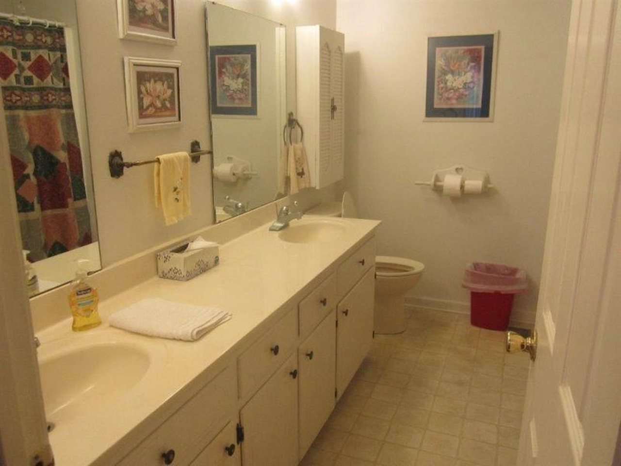 1741 Conner Whitefield Road Ripley, TN 38063 - Photo 22 of 24 a bathroom with a double vanity sink mirror and toilet