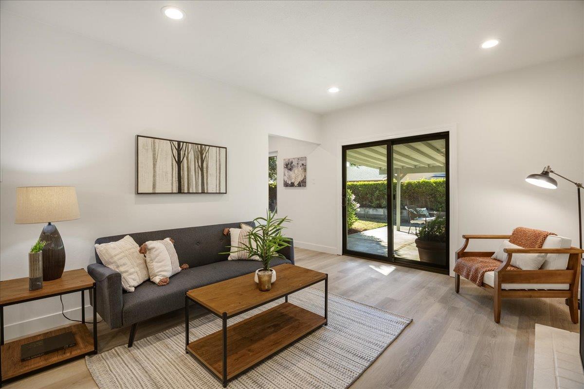 1069 Malott Drive San Jose, CA 95121 - Photo 12 of 32 a living room with furniture and a large window