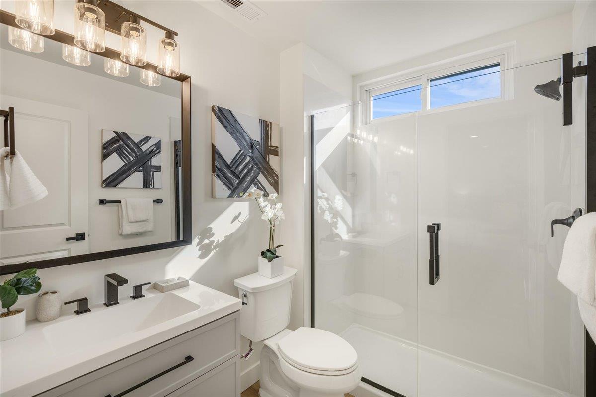 1069 Malott Drive San Jose, CA 95121 - Photo 20 of 32 a bathroom with a sink a toilet and shower