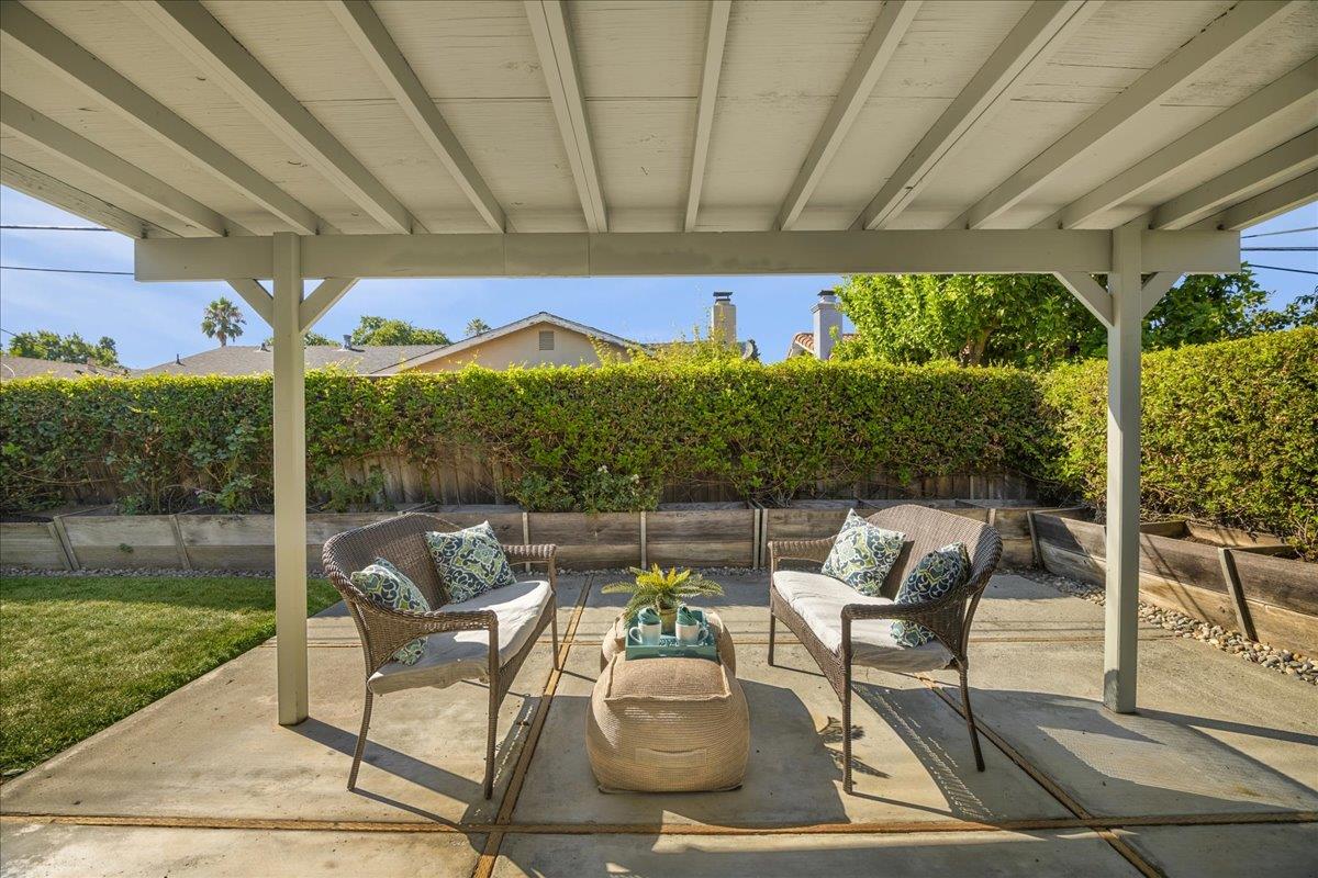 1069 Malott Drive San Jose, CA 95121 - Photo 27 of 32 a patio with yard glass top table and chairs