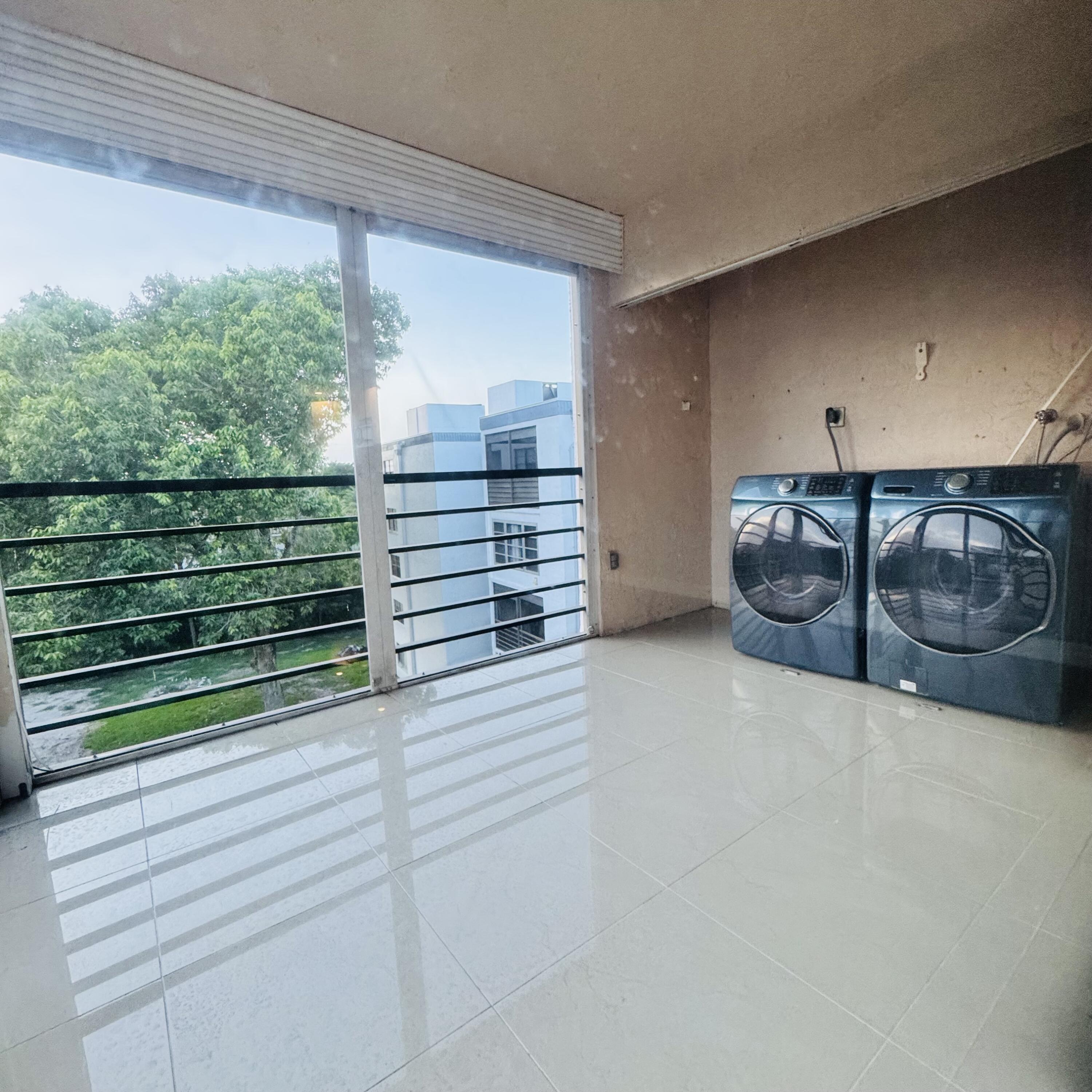 9235 Southwest 8th Street, Unit 503 Boca Raton, FL 33428 - Photo 7 of 17 a view of a balcony with an outdoor space