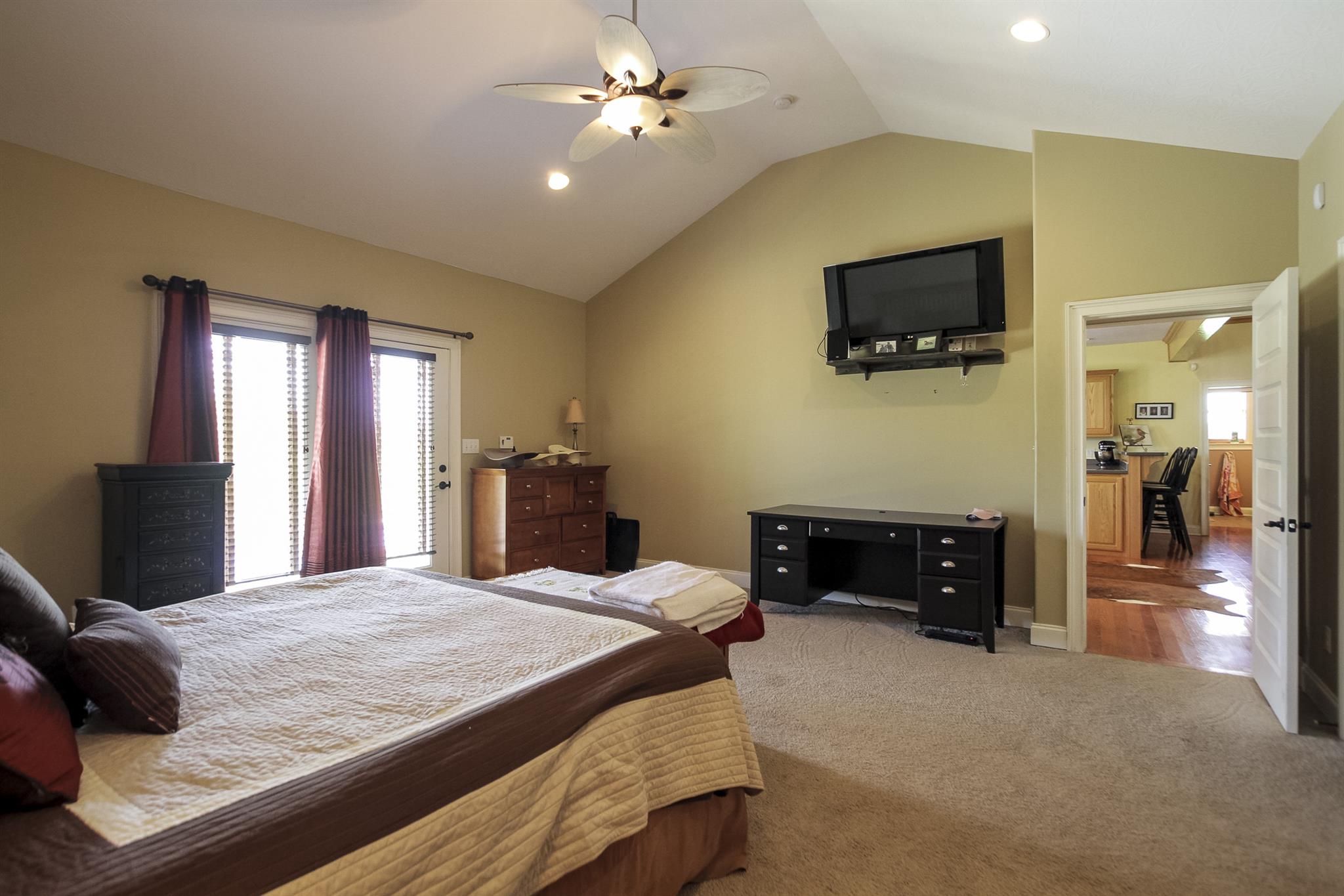 4599 Gamble Road Cedar Hill, TN 37032 - Photo 13 of 25 a bedroom with a bed and a flat screen tv