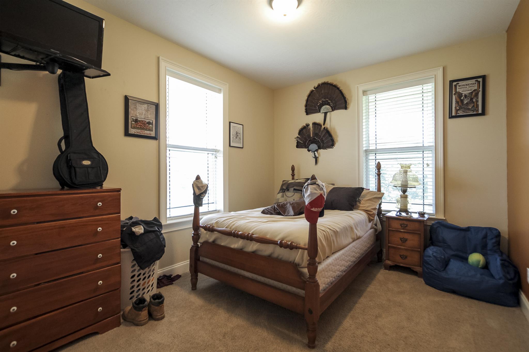 4599 Gamble Road Cedar Hill, TN 37032 - Photo 16 of 25 a bed room with a bed and a window